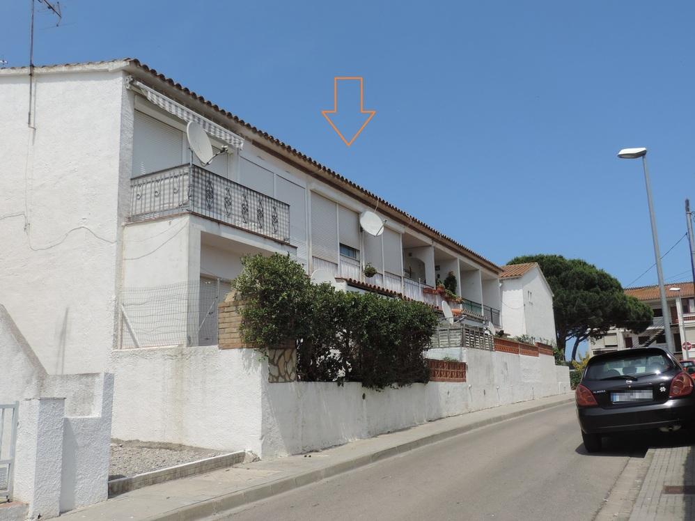 Fachada del edificio: Vivienda en Escala